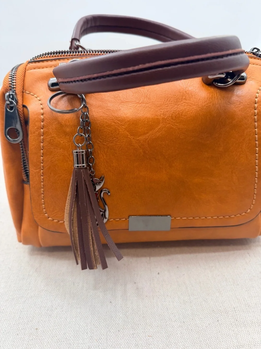 Structured Orange Satchel with Tassel Accent
